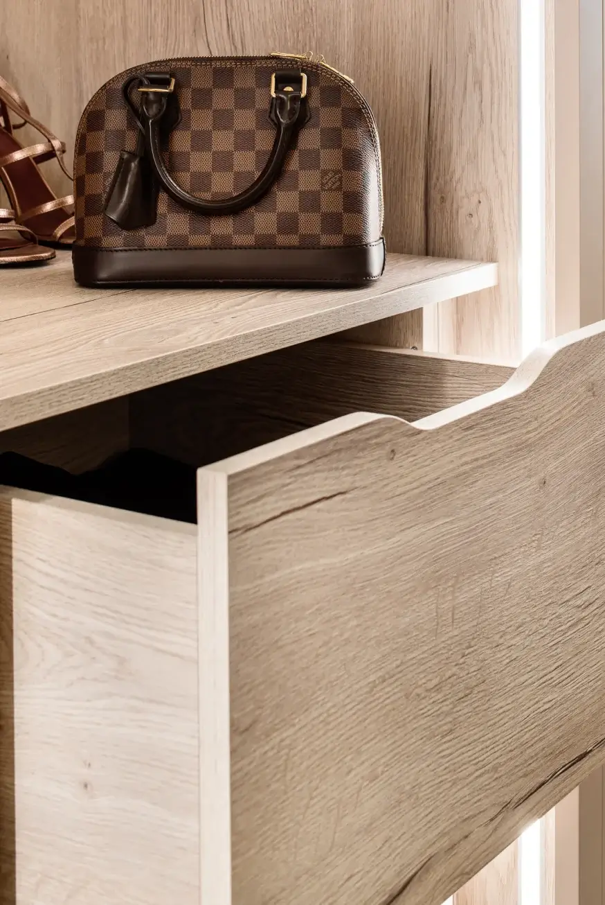 details of the bespoke joinery of built in drawers