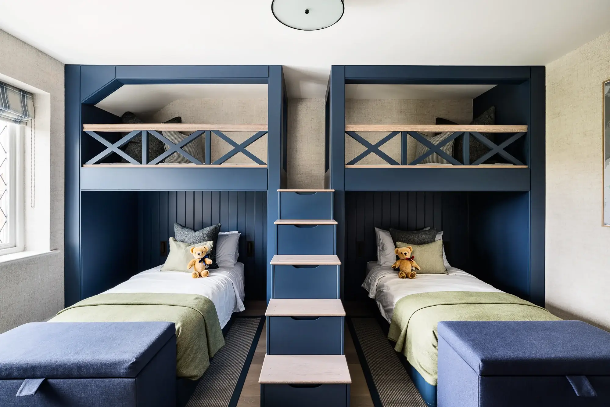 Blue bespoke bunk beds with den above